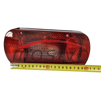 ŠTOP LAMPA UNIVERZALNA - POLUOKRUGLA ZADNJA LIJEVA 220 X 100 X 57 mm
